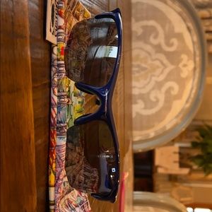 Kids blue and white Oakley sunglasses.